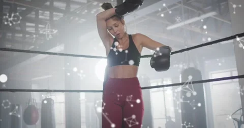Animation of molecules and data processing over caucasian woman exercising in Stock Footage 329409079
