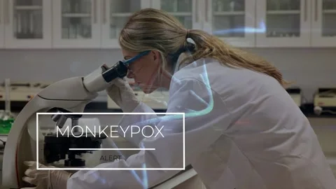 Animation of monkey pox over caucasian female lab worker with microscope Stock Footage 202346940