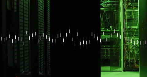 Animation of moving lines forming graph over illuminated data server rack in 스톡 동영상 310978310