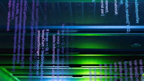 Animation of multicolored computer programming language over data server room Stock Footage 312717255