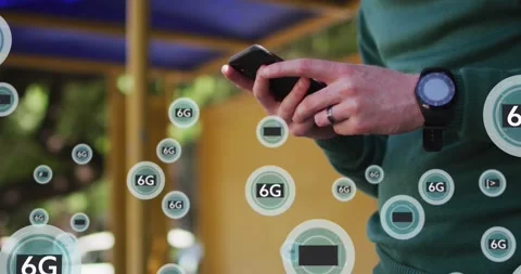 Animation of multiple 6g texts over midsection of caucasian man scrolling on Stock Footage 327646401