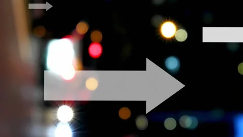 Animation of multiple up arrows over blurred vehicles moving on street in city Stock Footage 312304469