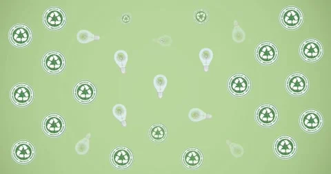 Animation of multiple falling recycling text and logos, and trees in lightbulbs Stock Footage 328405204