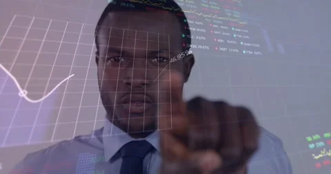 Animation of multiple graphs and trading boards, african american man pointing Stock Footage 249379632