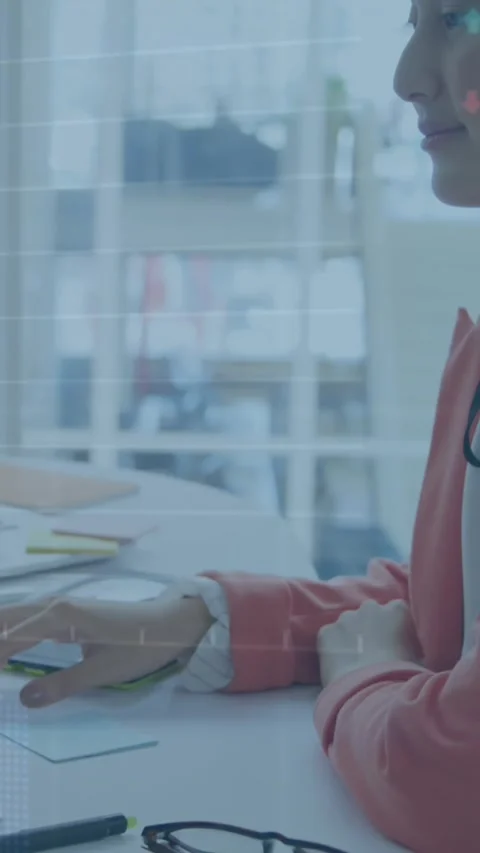 Animation of multiple graphs and trading board over asian woman using desktop at Stock Footage 344693676