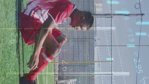 Animation of multiple graphs moving over multiracial soccer players practicing Stock Footage 312488180