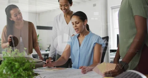 Animation of multiple icons over diverse female architects discussing about 動画素材 325704698