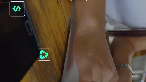 Animation of multiple icons over midsection of caucasian woman typing on Video stock 312304457