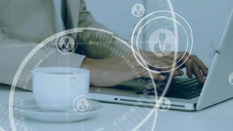 Animation of multiple profile icons over mid section of businessman using laptop Stock Footage 244735811