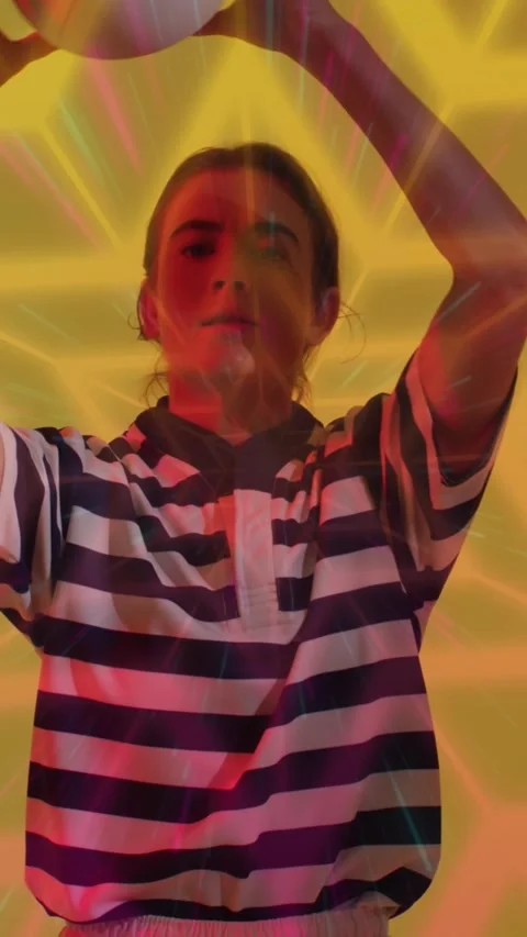 Animation of neon pattern over female rugby player on neon background Stock Footage 323899892