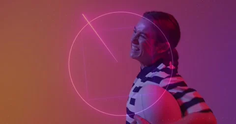 Animation of neon pattern over female rugby player on neon background Stock Footage 328402578