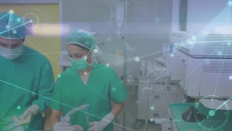 Animation of network connection over caucasian surgeons operating patient in Stock Footage 329687956