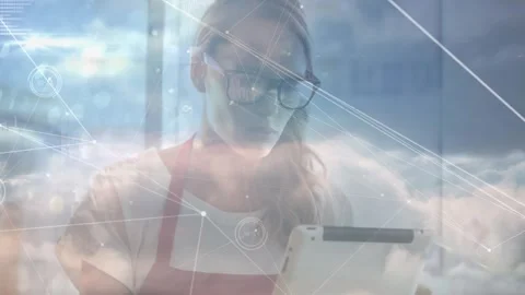 Animation of network of connections and clouds over caucasian female worker Stock Footage 327645804
