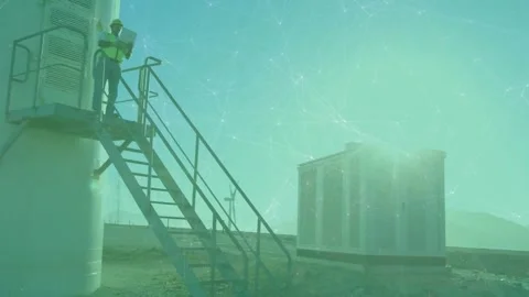Animation of network of connections and spots of light over male engineer Stock Footage 325962736