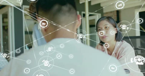 Animation of network of connections with globe icons over diverse business Stock Footage 310406903