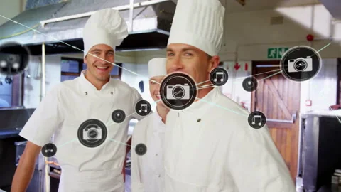 Animation of network of connections with icons over diverse cooks in kitchen Stock Footage 309975110