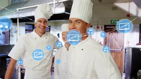 Animation of network of connections with icons over diverse cooks in kitchen Stock Footage 309975129