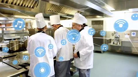 Animation of network of connections with icons over diverse cooks in kitchen Stock Footage 309975154
