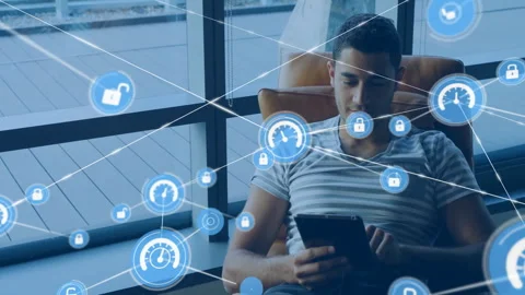 Animation of network of connections with icons over businessman in office Stock Footage 310221356