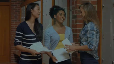 Animation of network of connections with icons over diverse students talking in Stock Footage 330113238