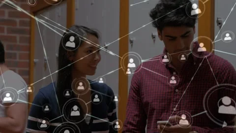 Animation of network of connections with icons over diverse students talking in Stock Footage 330659118