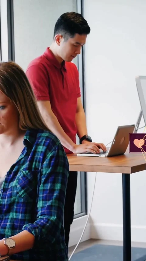 Animation of network of connections with icons over diverse colleagues working Stock Footage 342915653