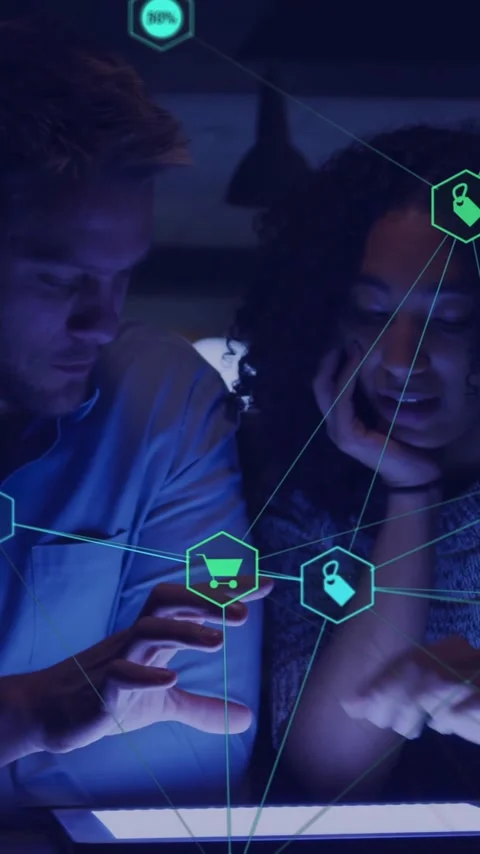 Animation of network of connections with icons over diverse colleagues using Stock Footage 343028339
