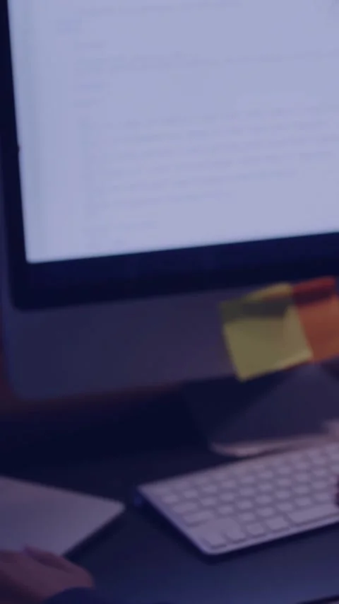 Animation of network of connections with icons over woman using laptop in office Stock Footage 344012132