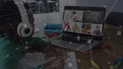 Animation of network of connections over african american boy using laptop for Stock Footage 329919671