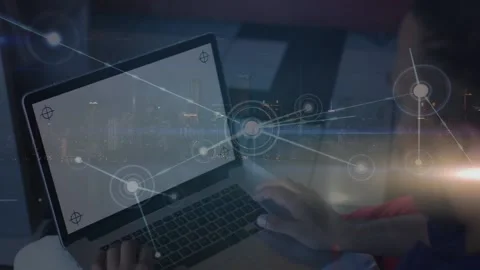 Animation of network of connections over biracial businessman using laptop with Vídeo Stock 231175786