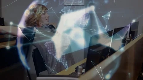 Animation of network of connections over caucasian male student using computer Stock Footage 329559604