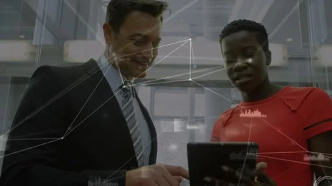 Animation of network of connections over diverse business people in office Stockbeeldmateriaal 329568610