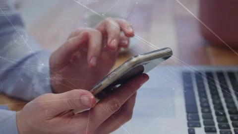 Animation of network of connections over man using smartphone 動画素材 316461929