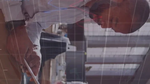 Animation of network of connections over students using computer Stock Footage 312905987