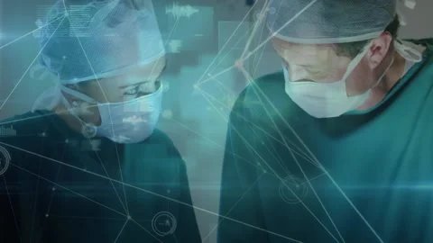 Animation of network of connections over surgeons in face masks 스톡 동영상 165091468