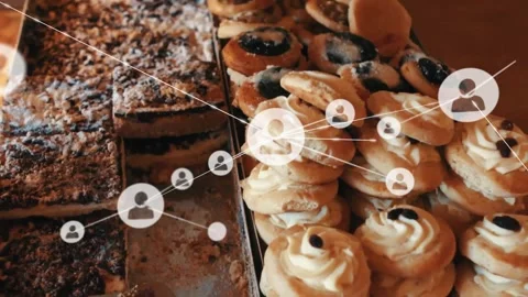 Animation of network of connections over sweets and cakes in bakery 스톡 동영상 325704939