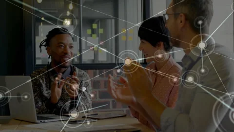 Animation of network over happy diverse colleagues clapping at casual office Stock Footage 266920965