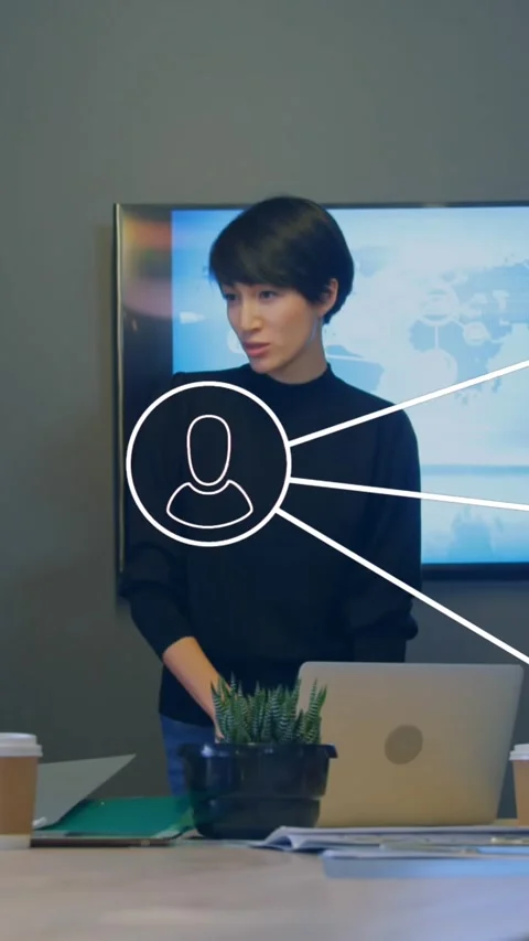 Animation of network of profile icons against diverse colleagues discussing Stock Footage 344706293