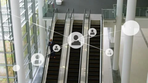 Animation of network of profile icons over businessman on escalator at modern Stock Footage 328836531