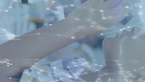 Animation of networks over schoolboy using microscope in science class Stock Footage 312386024