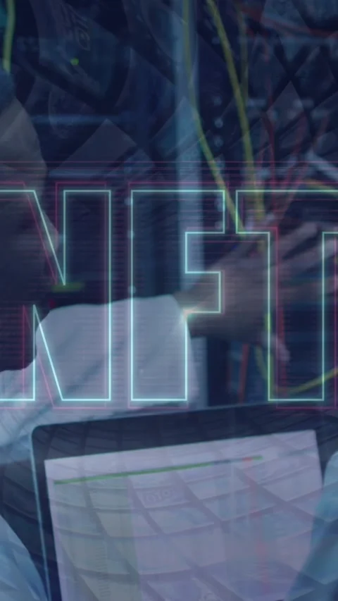 Animation of nft and data processing over diverse it engineers by computer Stock Footage 342608173