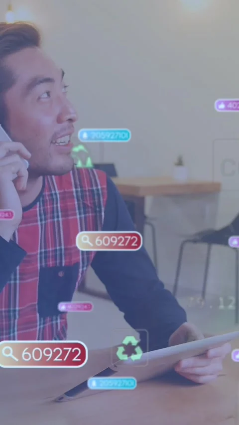 Animation of notification bars, icons, asian man looking at digital tablet and Stock Footage 344723701