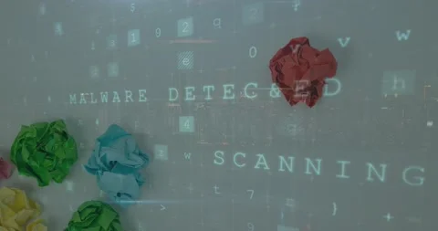 Animation of numbers and malware over crumbled colorful papers on white Stock Footage 220891394