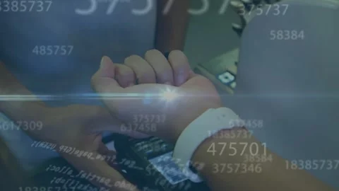 Animation of numbers, computer language, diverse man paying bill with smartwatch Stock Footage 328300070