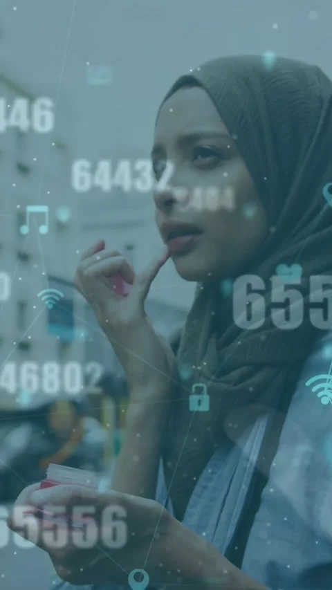 Animation of numbers, connected icons globes, woman wearing hijab applying cream Stock Footage 319222970