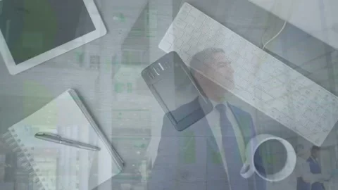 Animation of office table and data processing over businessman walking Stock Footage 329292212