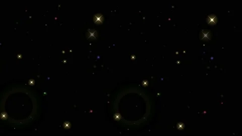 Animation orange light sparkles on black background.  Stock Footage 185959583