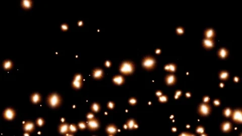 Animation orange light sparkles with black background.  Stock Footage 276370218