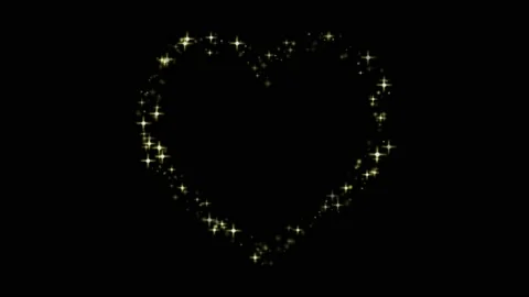 Animation orange light sparkles heart shape on black background.  Stock Footage 185960255