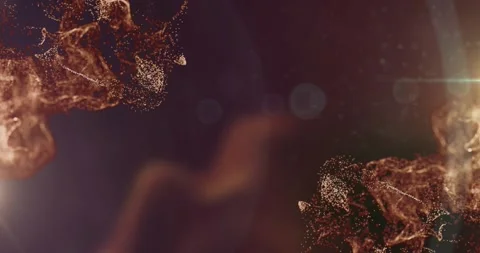 Animation of orange particles and bokeh lights moving on dark background Stock-Footage 328810385